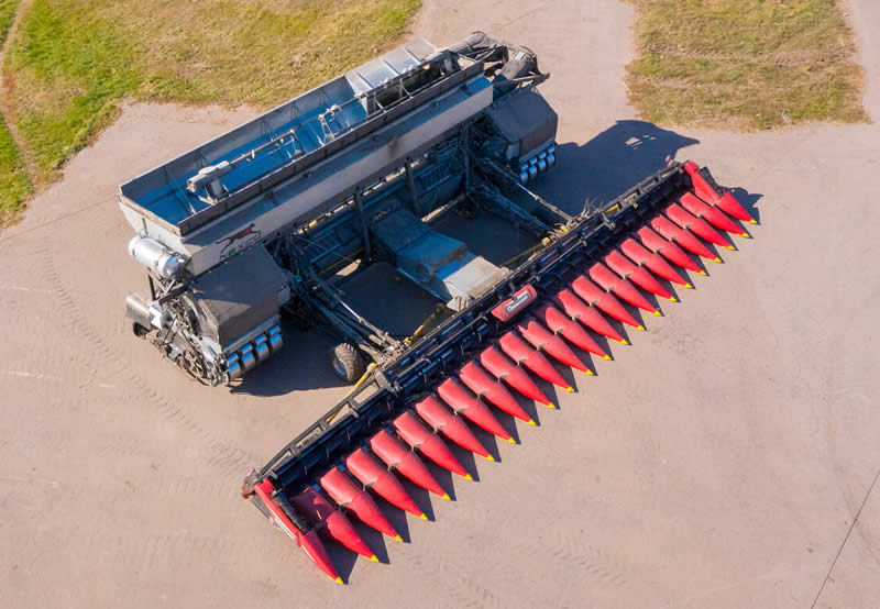 The NexCo combine harvester attachment can be seen with a Geringoff corn picker.